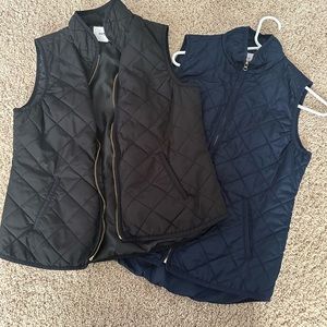 Two light weight Old Navy vests. Size M. Blue and black.